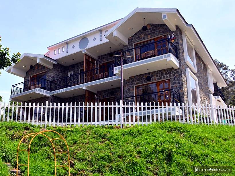 The finished Sri Heaven's Stay resort on its landscaped hillside.